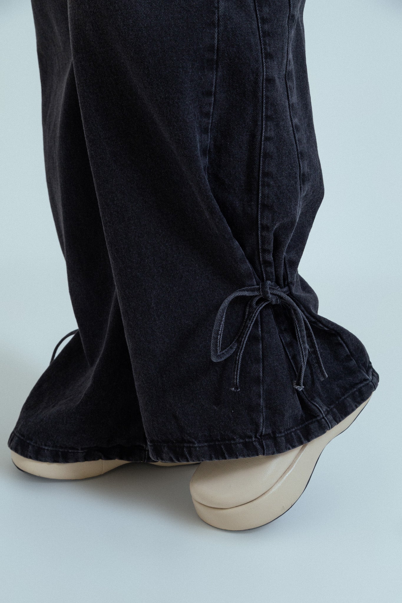 calça jeans ajustável laço midnight black
