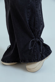 calça jeans ajustável laço midnight black