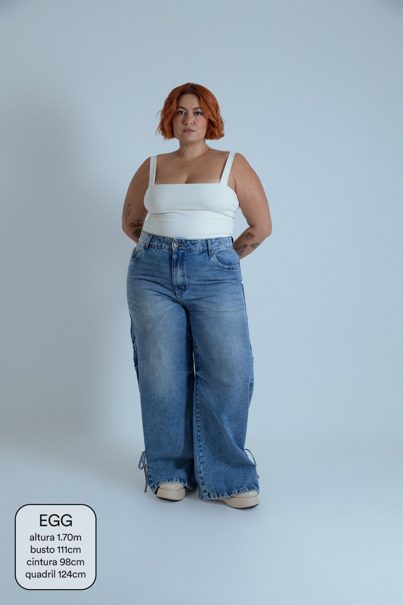 calça jeans ajustável laço acid wash