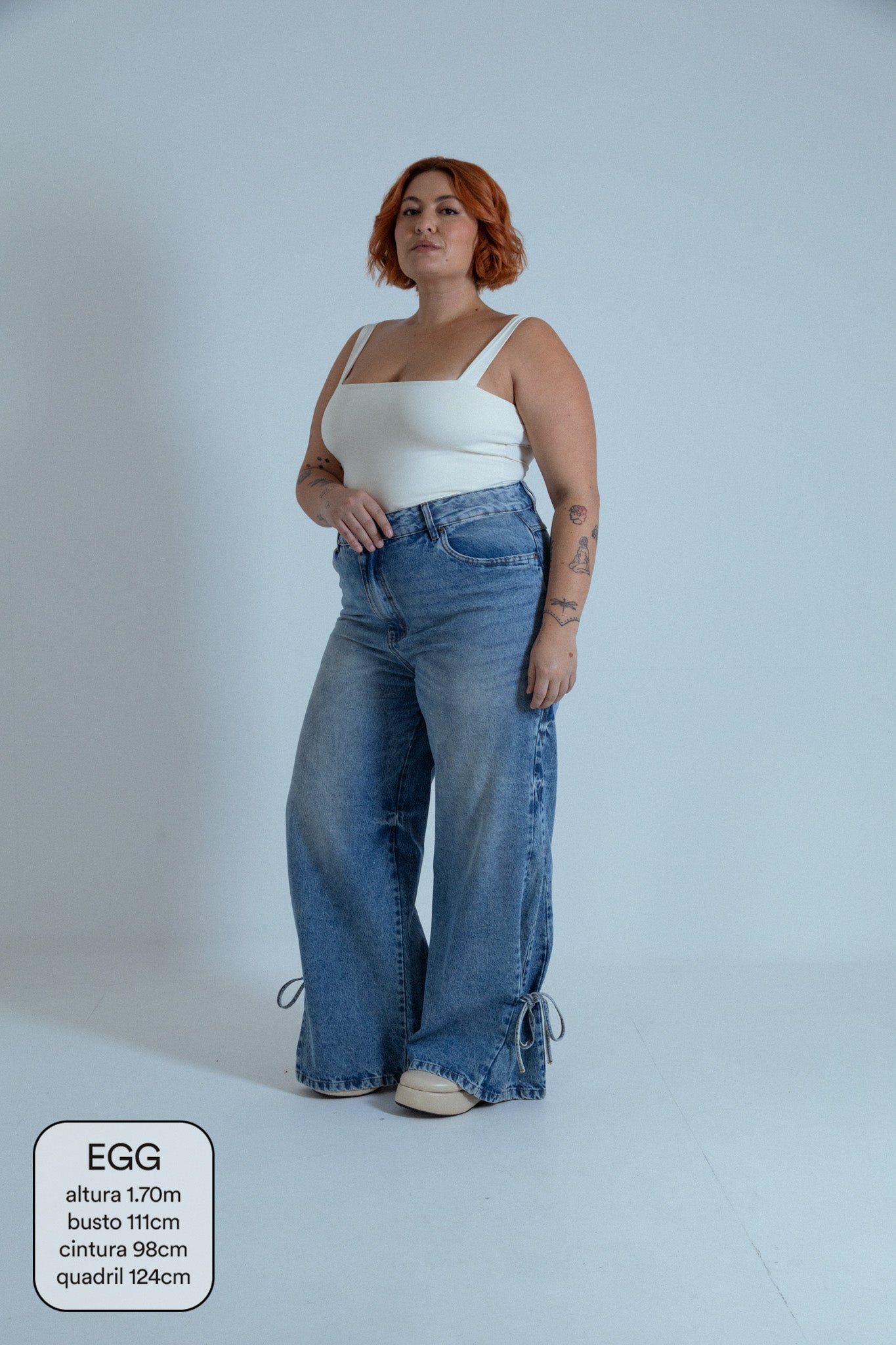 calça jeans ajustável laço acid wash
