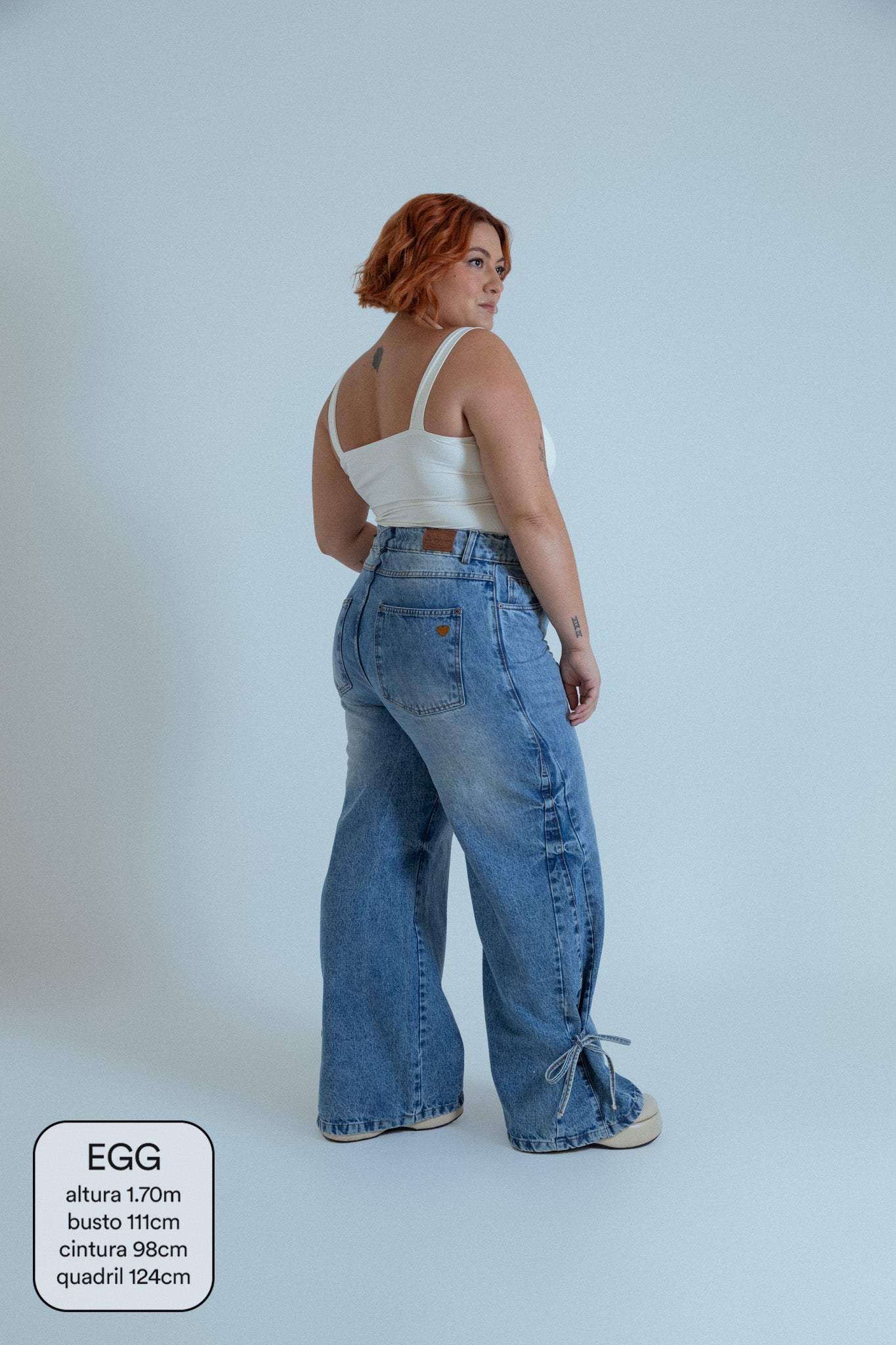 calça jeans ajustável laço acid wash