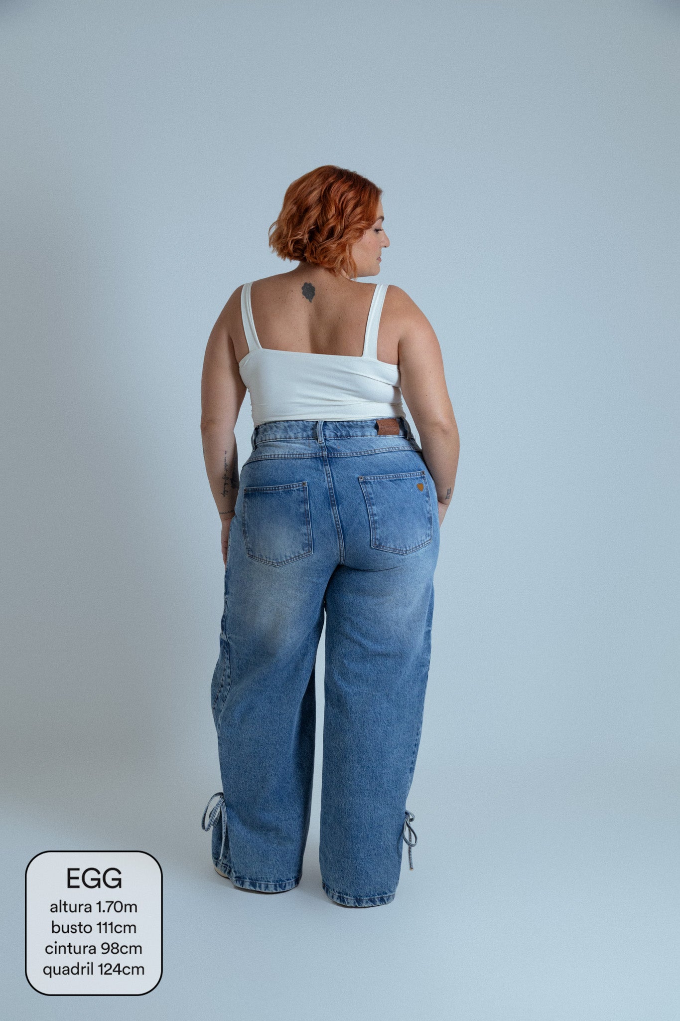 calça jeans ajustável laço acid wash