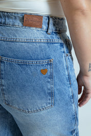 calça jeans ajustável laço acid wash