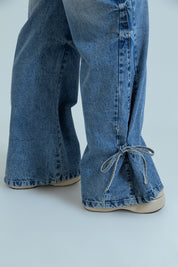 calça jeans ajustável laço acid wash