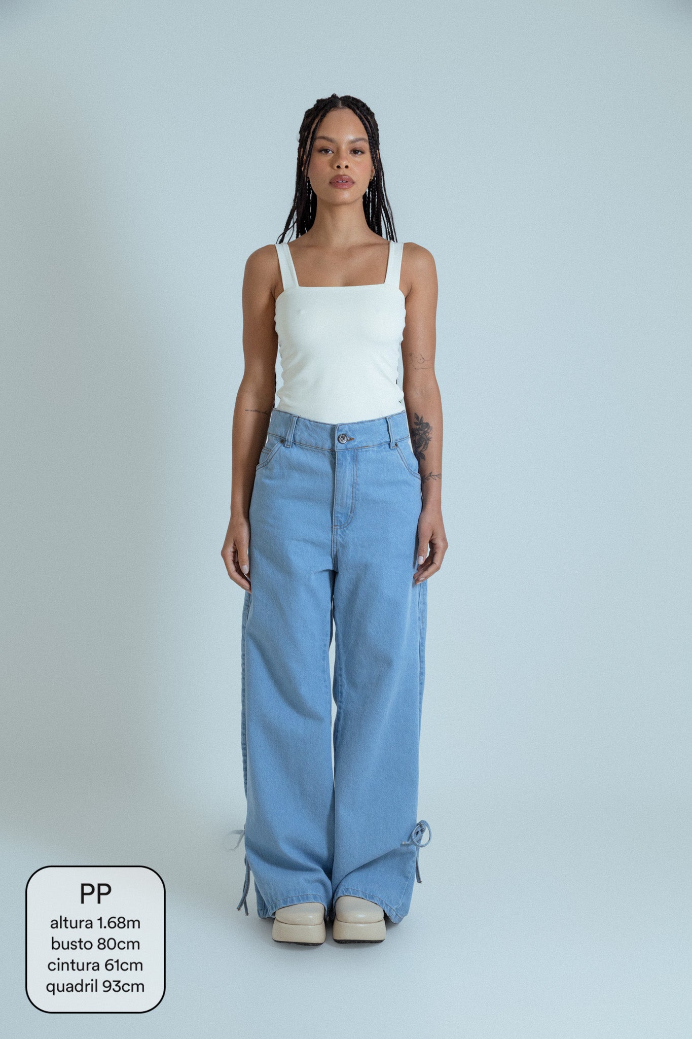 calça jeans ajustável laço light blue