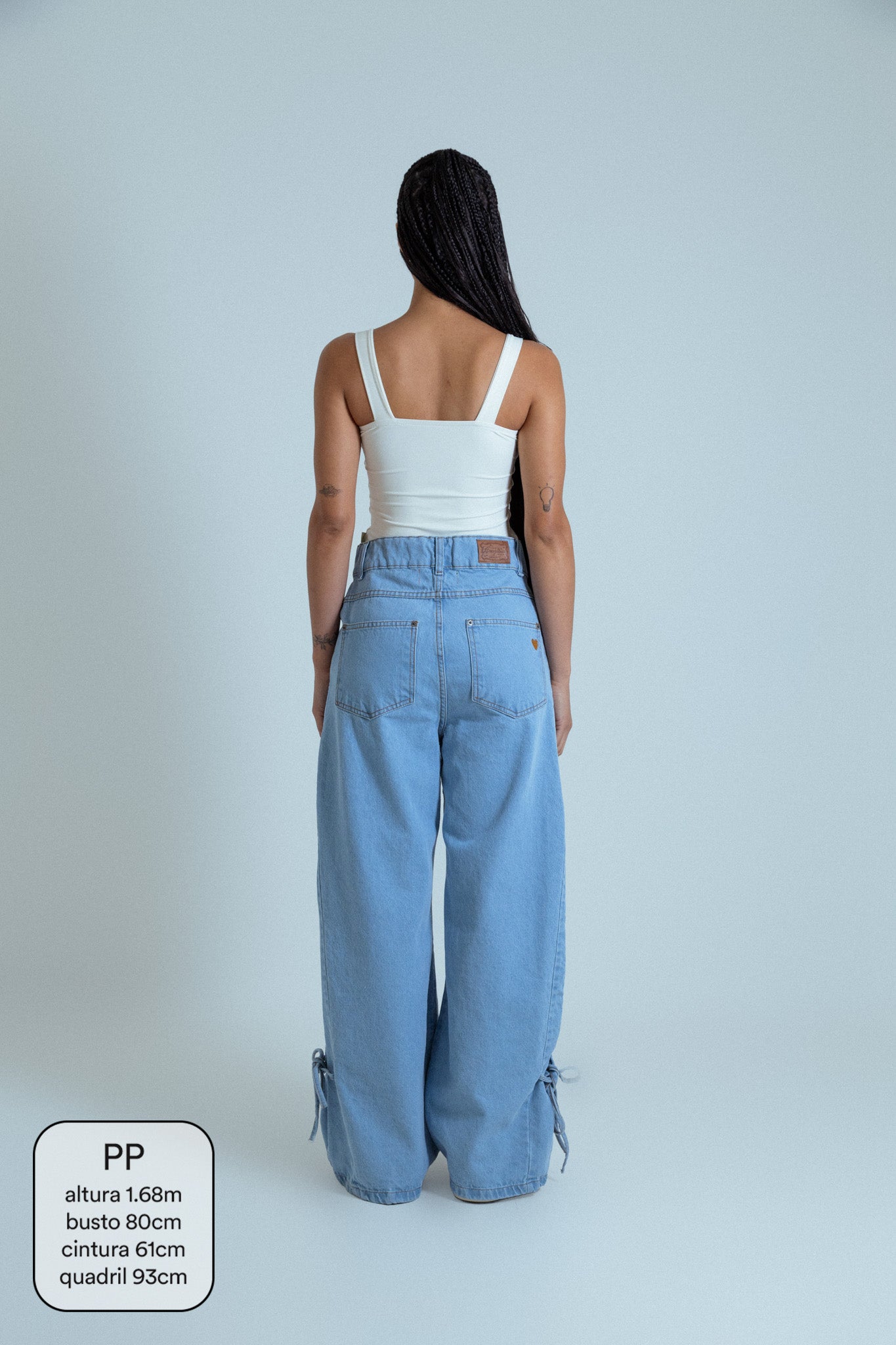 calça jeans ajustável laço light blue