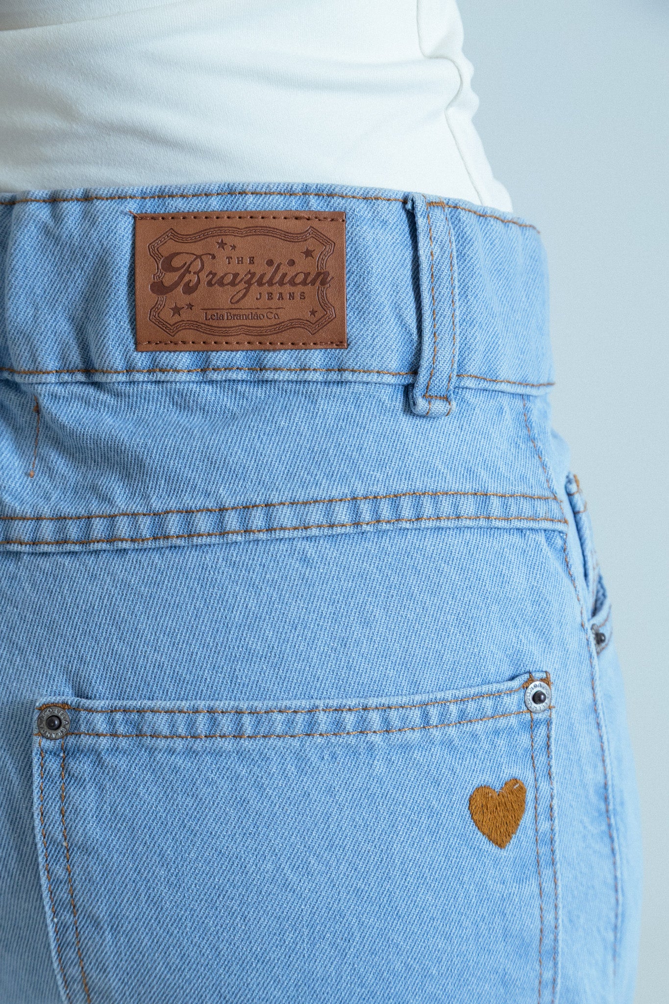 calça jeans ajustável laço light blue