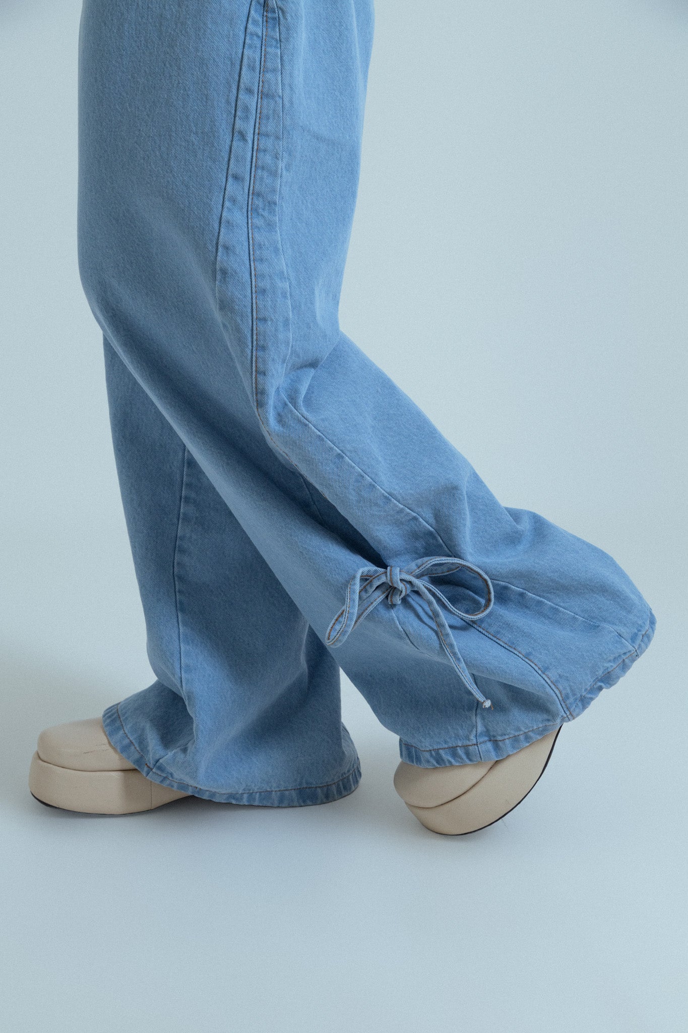 calça jeans ajustável laço light blue