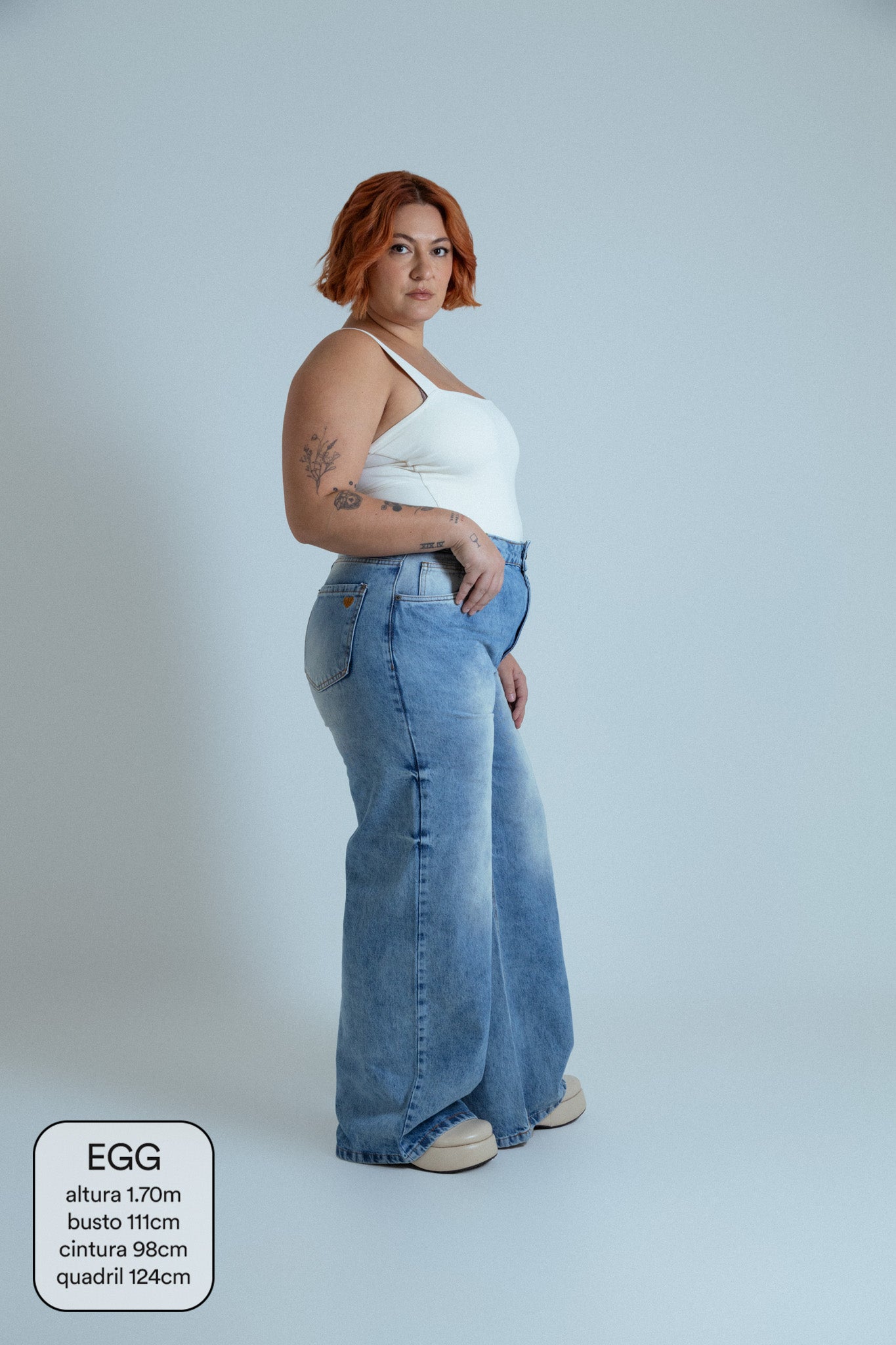calça jeans ajustável wide acid wash