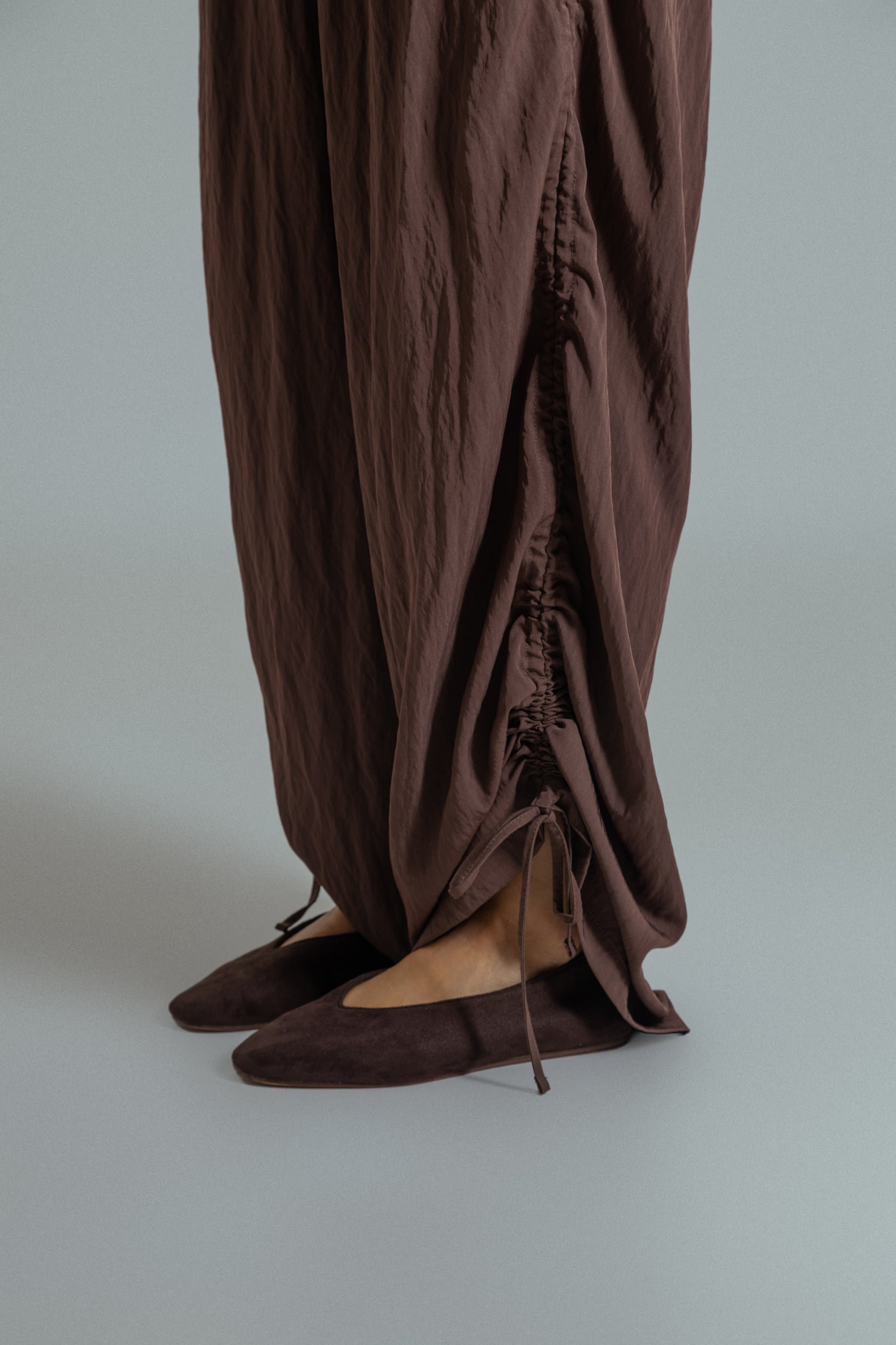 calça franzida com altura ajustável