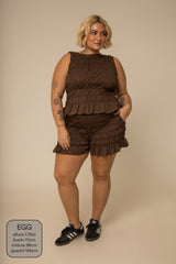 short rancho lastex com bolsos