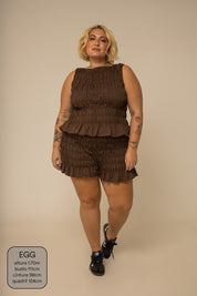 short rancho lastex com bolsos