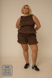 short rancho lastex com bolsos