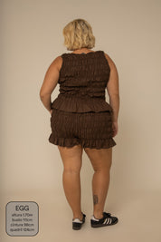 short rancho lastex com bolsos