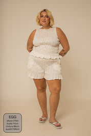 short rancho lastex com bolsos