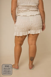 short rancho lastex com bolsos