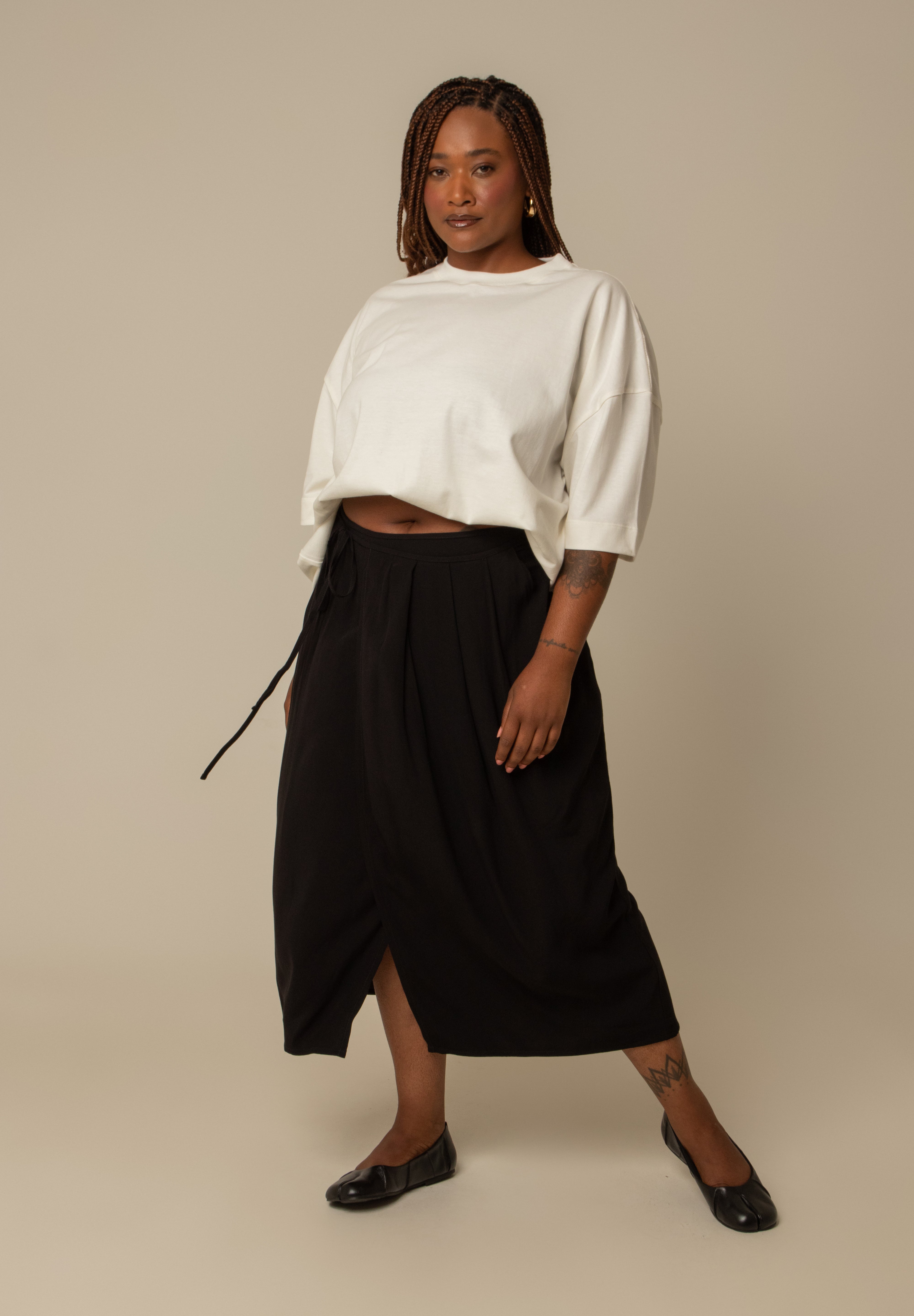 saia midi envelope com bolsos
