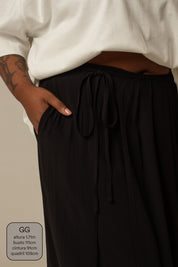 saia midi envelope com bolsos