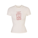 baby tee confie nas cartas collab manu xavier